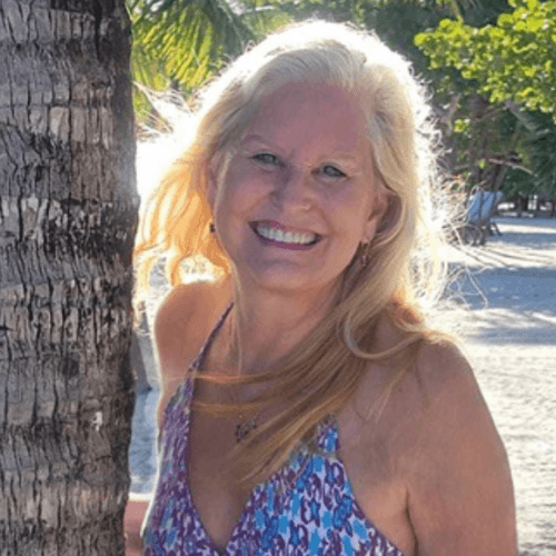 Jyll Hoyrup laughing in Belize — intuitive energy healer and coach